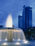 Deutsche Bank with Water Fountain Illuminated at Dusk, Frankfurt Am Main, Germany, Europe Photographic Print by Scholey Peter
