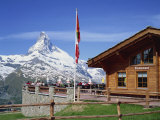 Tourists on the Balcony of the Restaurant at Sunnegga Looking at the Matterhorn in Switzerland Photographic Print by Rainford Roy