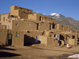 Woman Sweeping Up, in Front of the Adobe Buildings, Dating from 1450, Taos Pueblo, New Mexico, USA Photographic Print by Westwater Nedra
