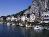 Boats Line the Waterfront on the River Meuse in the Old Town of Dinant in the Ardennes, Belgium Photographic Print by Merten Hans Peter
