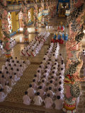 Rows of Monks at Prayer Inside a Temple of the Caodai Religious Sect, at Tay Ninh, Vietnam Photographic Print by Waltham Tony