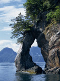 Natural Arch on Edge of Threehole Bay, Kenai Fjords, Aialik Peninsula, Alaska, USA Photographic Print by Waltham Tony