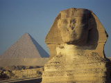 Sphinx and One of the Pyramids at Giza, UNESCO World Heritage Site, Cairo, Egypt Photographic Print by Simanor Eitan