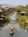 Men Standing Up Paddling Canoes Through Floating Village, Inle Lake, Shan State, Myanmar Photographic Print by Jane Sweeney