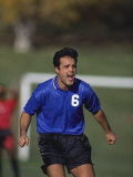Soccer Player Celebrating after Scoring a Goal Photographic Print