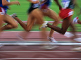 Detail of Blurred Action of Legs in Womens Race Photographie par Paul Sutton