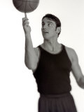 Portrait of Male Basketball Player Spinning the Ball Photographic Print by Chris Trotman
