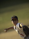 Young Boy Pitching During a Little League Baseball Games Photographic Print