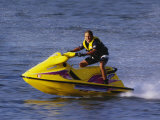 Teenage Boy Riding His Jetski Photographic Print