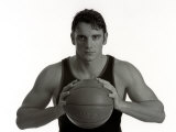 Portrait of Male Basketball Player Holding the Ball Photographic Print by Chris Trotman