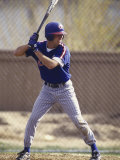 Baseball Player in Action Batting Photographic Print