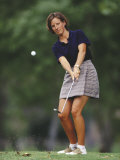 Woman Golfer in Action Photographic Print by Chris Trotman