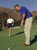 Couple on the Golf Cource Photographic Print by Chris Trotman