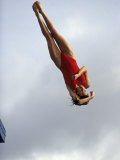 Women Diver Flying Through the Air, California, USA Photographic Print by Paul Sutton