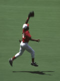 Baseball Player Leaping to Make a Catch Photographic Print