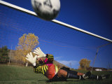 Soccer Goalie in Action Photographic Print