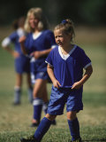 8 Year Old Girl in Action Durring Soccer Game, Lakewood, Colorado, USA Photographic Print
