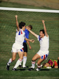 Soccer Players Celebrating after Scoring a Goal Photographic Print