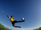 Male Soccer Player in Action Photographie