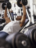 Male Working Out with Weights in a Health Club, Rutland, Vermont, USA Photographic Print by Chris Trotman