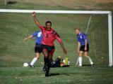 Soccer Player Celebrating after Scoring a Goal Photographic Print