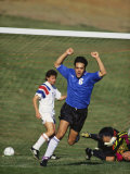 Soccer Player Celebrating after Scoring a Goal Photographic Print