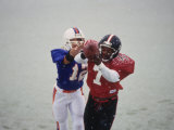 American Football Player Reaching for the Ball Photographic Print