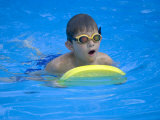 9 Year Old Boy Swimming in Pool, Kiamesha Lake, New York, USA Photographic Print by Paul Sutton