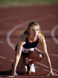 Female Runner at the Start of a Track Race Lámina fotográfica
