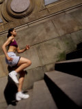 Hispanic Woman Running Up Stairs, New York, New York, USA Photographic Print by Paul Sutton
