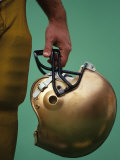 Football Player Holding His Helmet Photographic Print by Chris Trotman