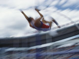 Pole Vaulter Flys over the Bar Photographic Print by Steven Sutton