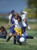 8 Year Old Girls in Action Durring Soccer Game, Lakewood, Colorado, USA Photographic Print