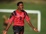 Soccer Player Celebrating after Scoring a Goal Photographic Print