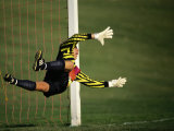 Soccer Goalie in Action Photographic Print