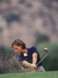 Woman Golfer in Action Photographic Print by Chris Trotman