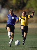 Soccer Players Fighting for the Ball Photographic Print