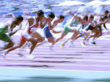 Blured Action at the Start of a Mens 100 Meter Track and Field Race Photographic Print by Paul Sutton