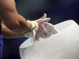 Detail of the Hands of Male Gymnast Preparing for Competition Photographic Print by Paul Sutton