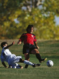 Soccer Players in Action Photographic Print