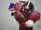 American Football Player Reaching for the Ball Photographic Print