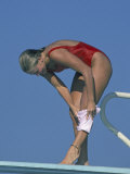 Woman Preparing to Dive Off Spingboard Photographic Print