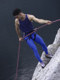 Male Rock Climbing Lámina fotográfica por Paul Sutton