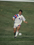 Soccer Player Celebrating after Scoring a Goal Photographic Print