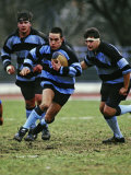 Rugby Players in Action, Paris, France Photographie par Paul Sutton