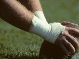 Football Center About to Snap the Ball Photographic Print by Paul Sutton