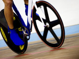 Detail of Cyclist Racing on the Velodrome Track, Athens, Greece Photographic Print by Paul Sutton