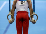 Male Gymnast Competing on Rings in Men's Qualification, 2004 Olympic Summer Games, Athens, Greece,  Photographic Print by Steven Sutton