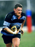 Rugby Player in Action, Paris, France Photographic Print by Paul Sutton
