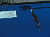 Woman Diving Off the Springboard Photographic Print